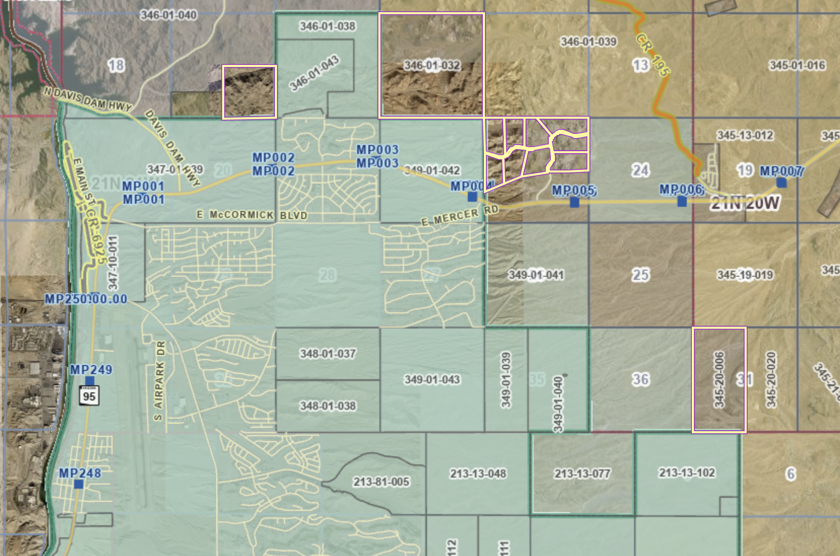A detailed map showing land parcels, roads, and geographic markers in a region near Davis Dam, with colored overlays indicating different areas and property boundaries.