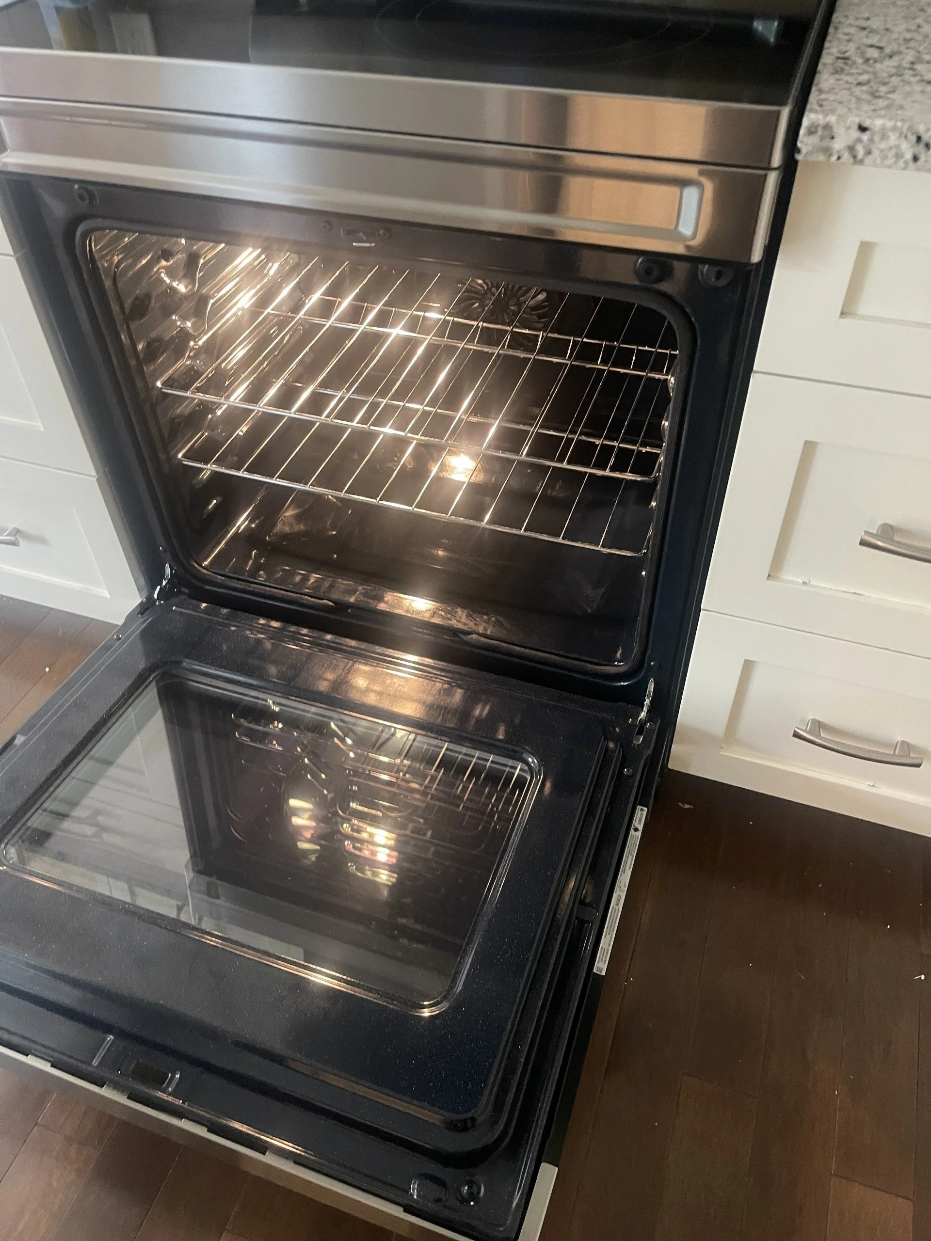 Sparkling clean oven interior after a deep clean by AAE Home Glow, Calgary residential cleaning.