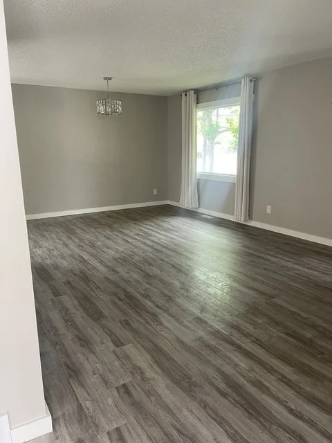 Bright, spotless living room after a deep clean by AAE Home Glow's residential cleaning team.
