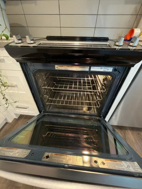 Sparkling clean oven interior after a deep clean by AAE Home Glow, Calgary residential cleaning.