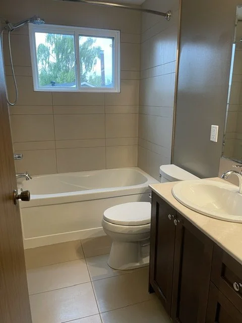 Spotless bathroom vanity and floors after a deep clean by AAE Home Glow in Calgary.