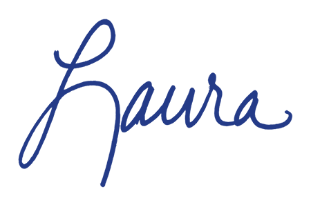 Handwritten blue script spelling 'Laura' on a white background.