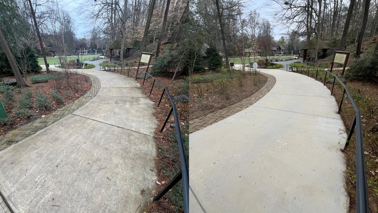 Side-by-side comparison of a winding concrete pathway in a park, with the left side showing a darker, weathered surface and the right side showing a lighter, cleaner surface.