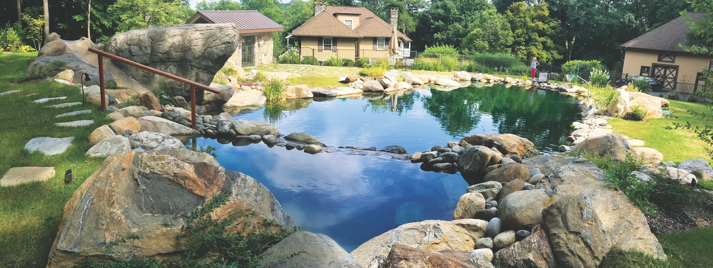 Oranssi technician working on a roof project