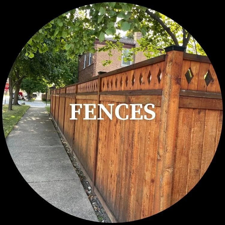 Wooden privacy fence along a sidewalk with a tree overhead, in front of a house, with the word "FENCES" overlayed.
