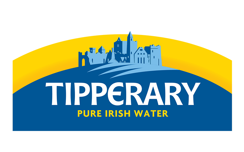 Logo of Tipperary Pure Irish Water featuring a blue silhouette of a castle and village on a yellow and blue background, with text in white and yellow.