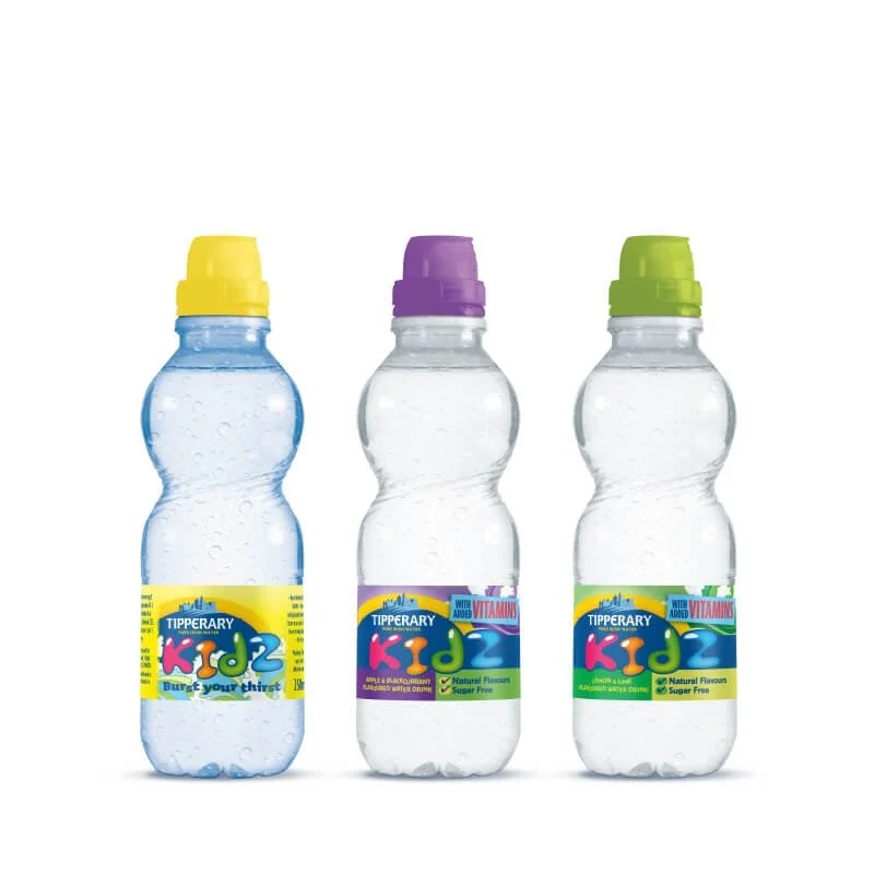 Three bottles of Tipperary Kids flavored water drinks with colorful caps and labels, including blue with yellow cap, clear with purple cap, and clear with green cap