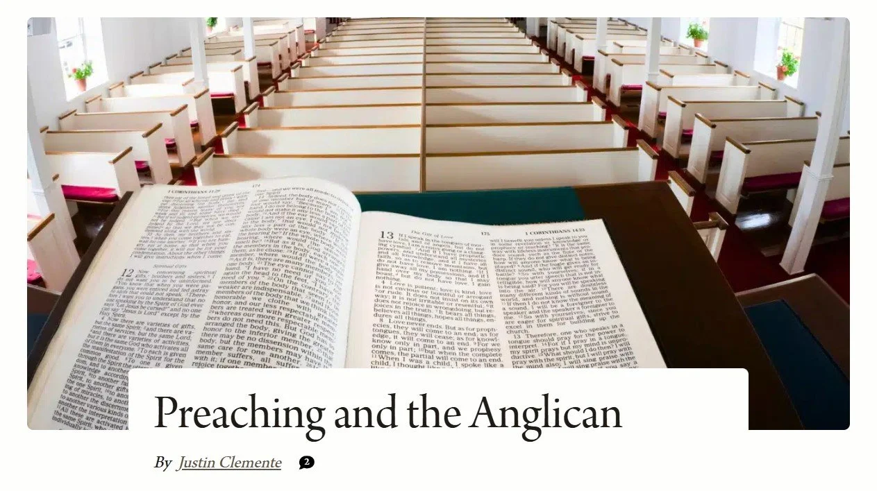 Open Bible on a pulpit inside a church with empty pews and potted plants on windowsills in the background.