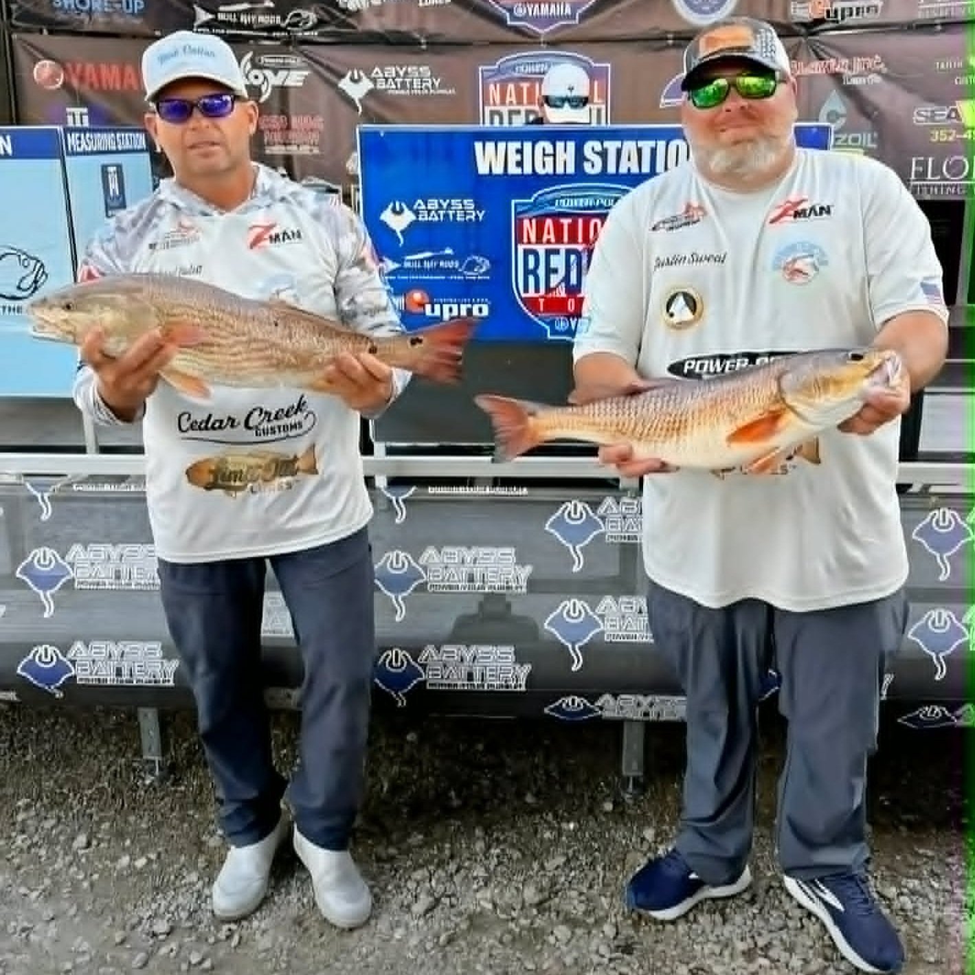 Richard+Holding+Redfish+At+Power+pole+National+Redfish+Tour.jpg