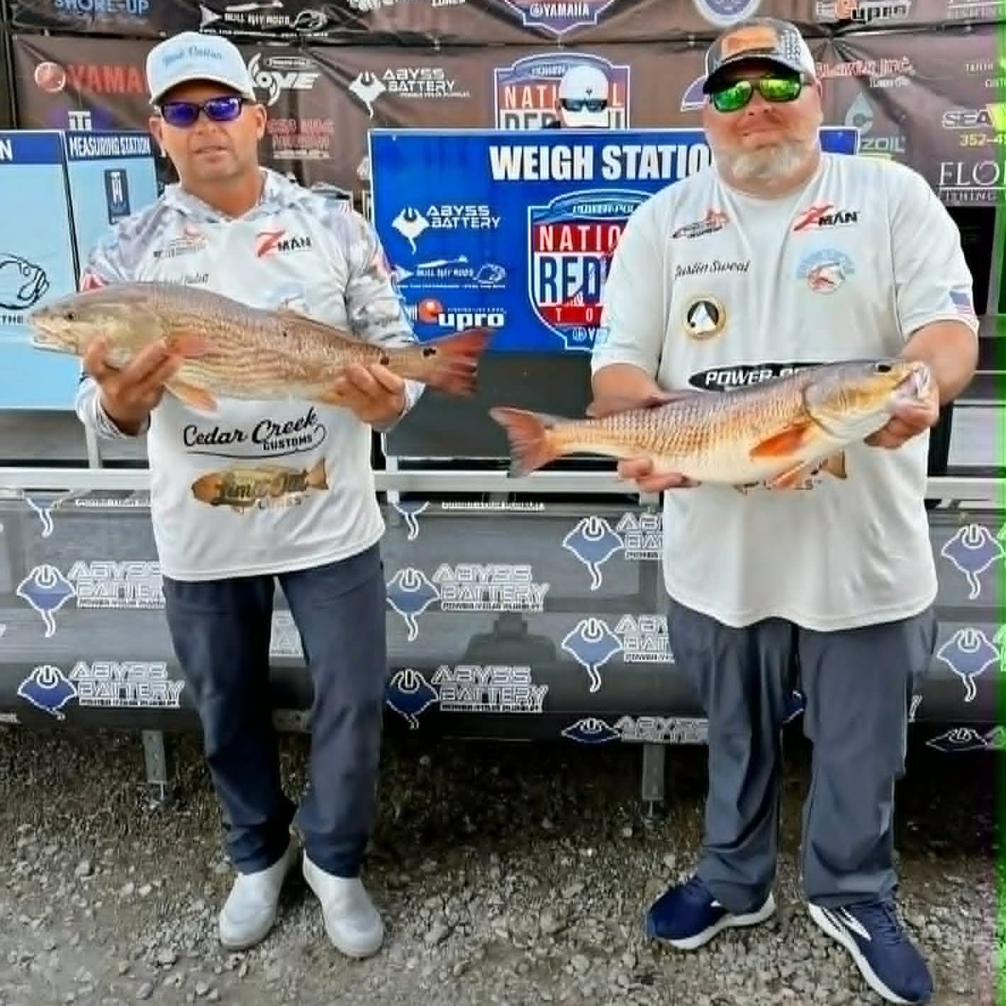 Richard%2BHolding%2BRedfish%2BAt%2BPower%2Bpole%2BNational%2BRedfish%2BTour_compressed.jpg