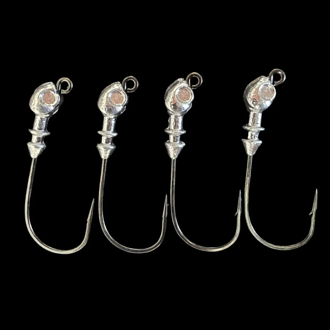 Poison Tail jig heads with 3/0 VMC hooks and ribbed bait keepers to hold your soft plastics. Available in 1/8, 3/16, 1/4 and 3/8 oz. Shop Limit Out Lures.