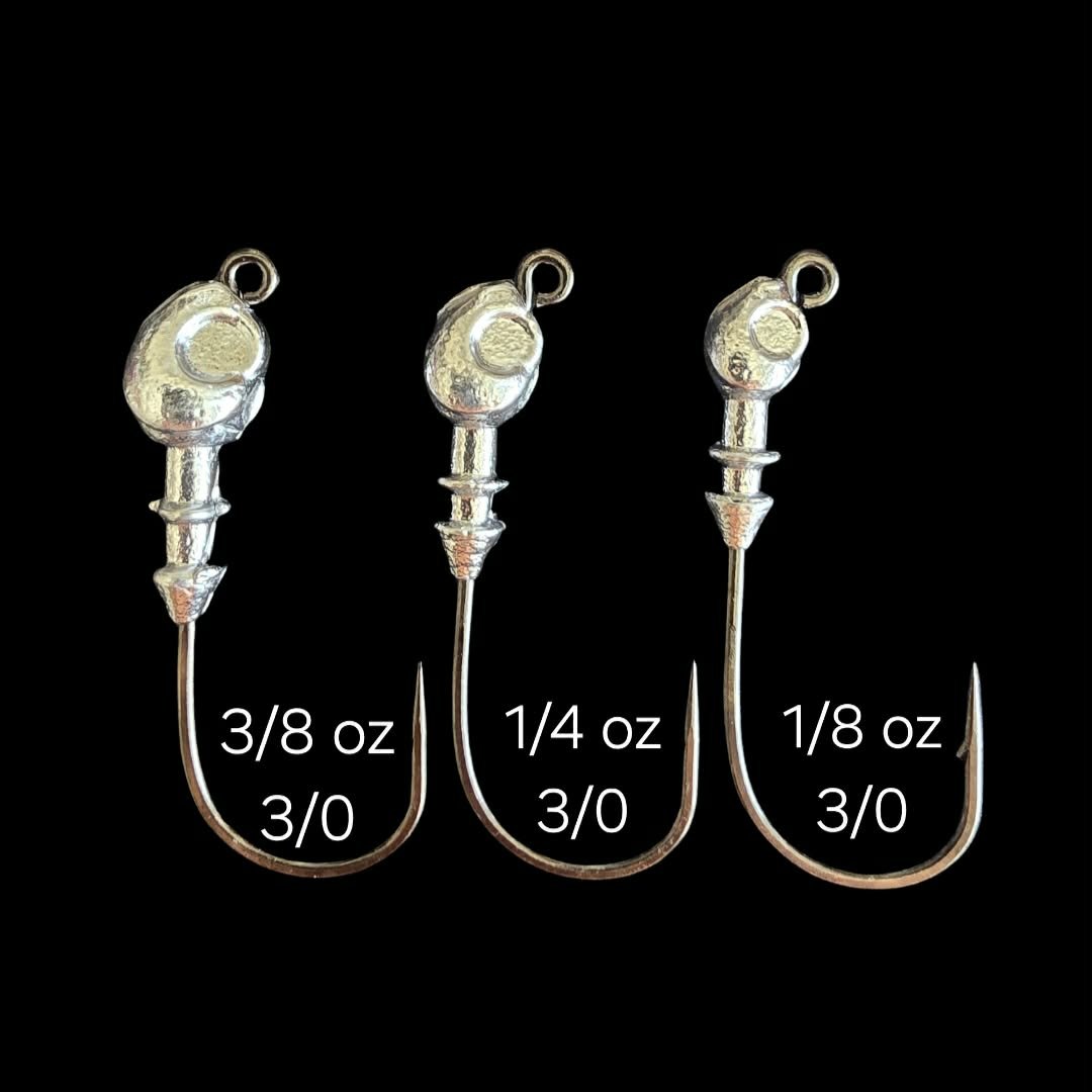 Poison Tail jig heads with 3/0 VMC hooks and ribbed bait keepers to hold your soft plastics. Available in 1/8, 3/16, 1/4 and 3/8 oz. Shop Limit Out Lures.
