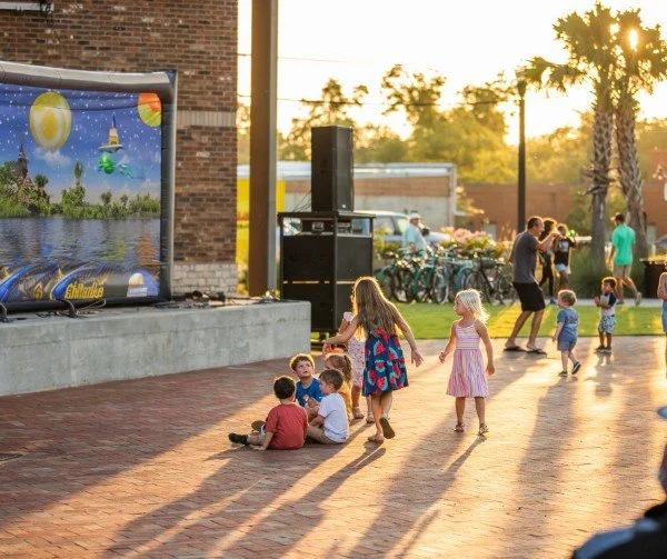 Families enjoying a Family Movie Night at The Ritz in downtown Thomasville, GA