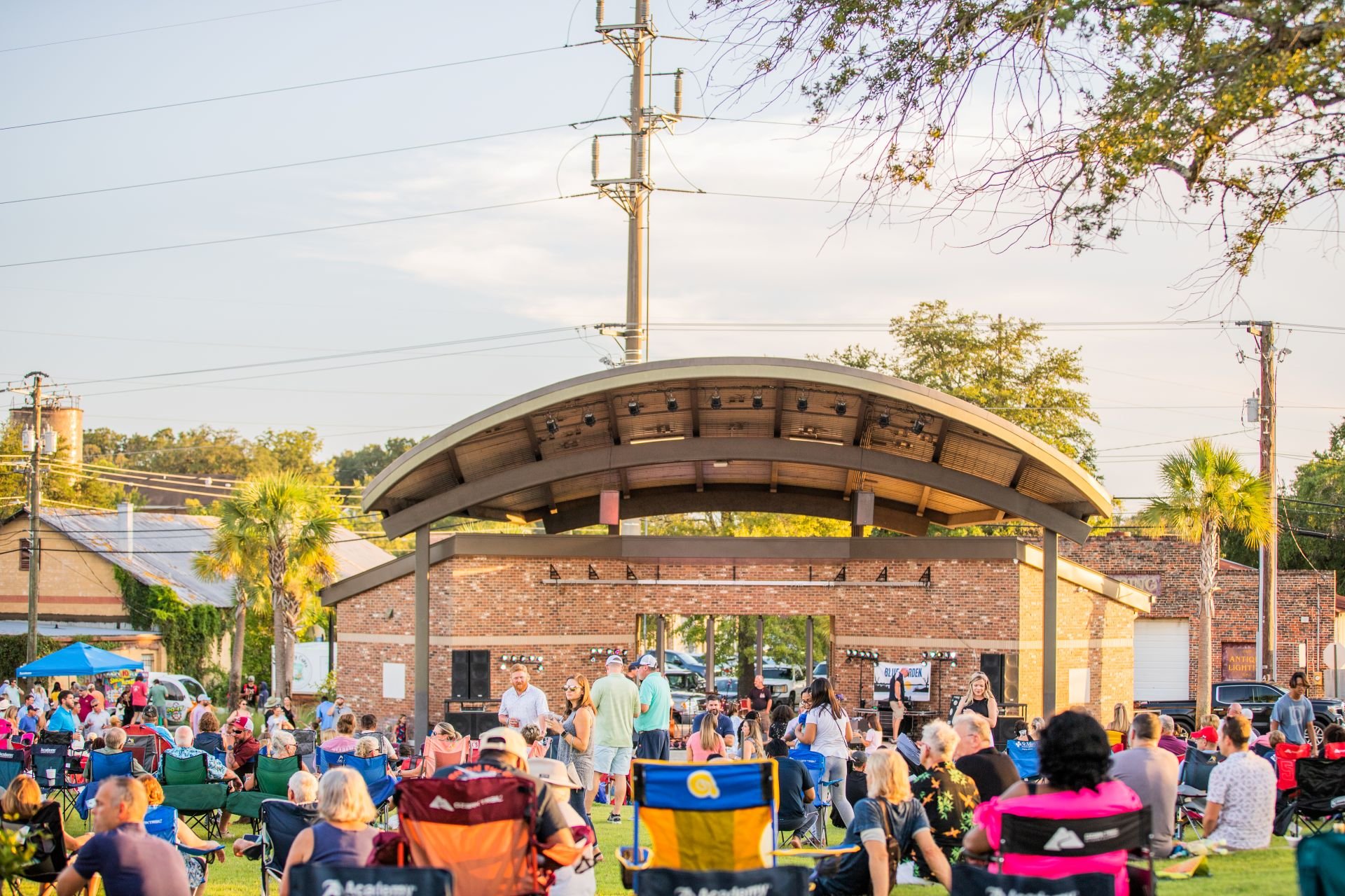 A crowd gathering for a live concert at the Ritz Amphitheater in Thomasville, GA