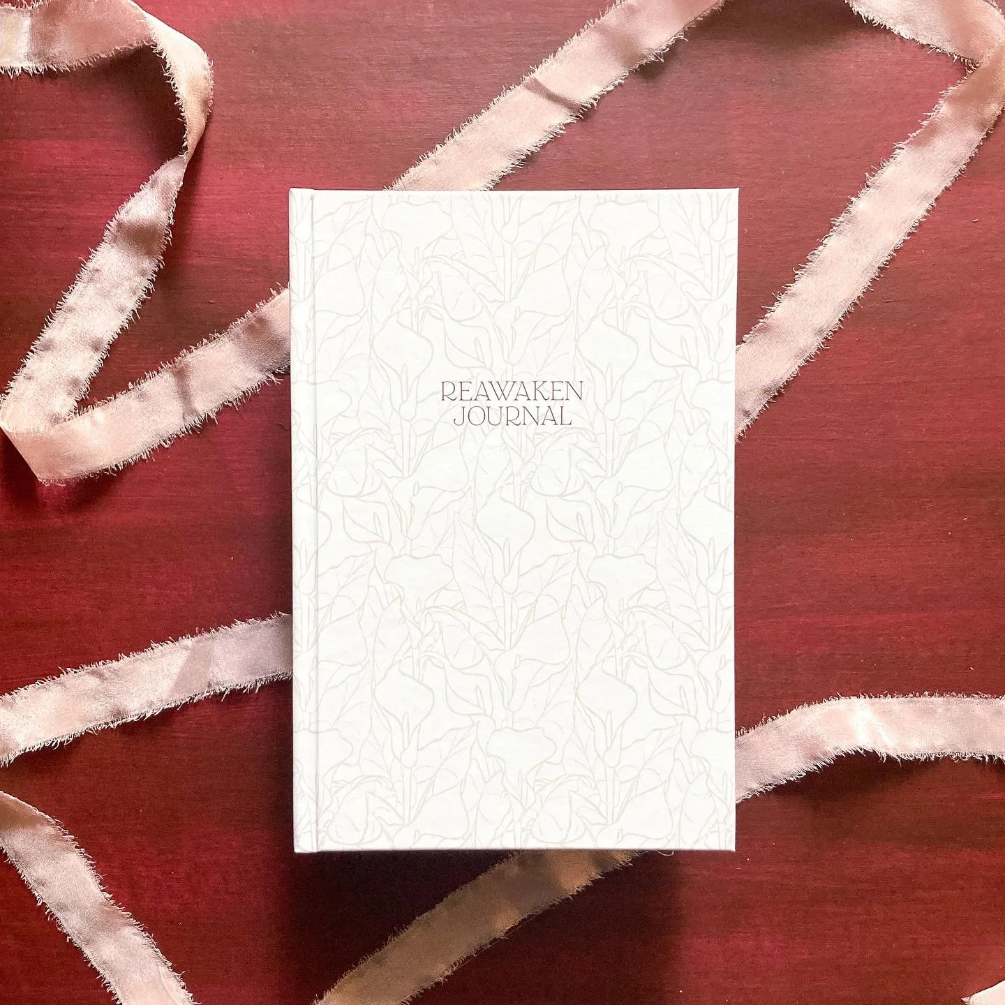 Announcing the Reawaken Journal 🤍

For those of you who are already using a planner you love: I&rsquo;ve got something for you too!!

This 200-page lined journal has intentional, but optional, prompts written on every spread so you have the option t