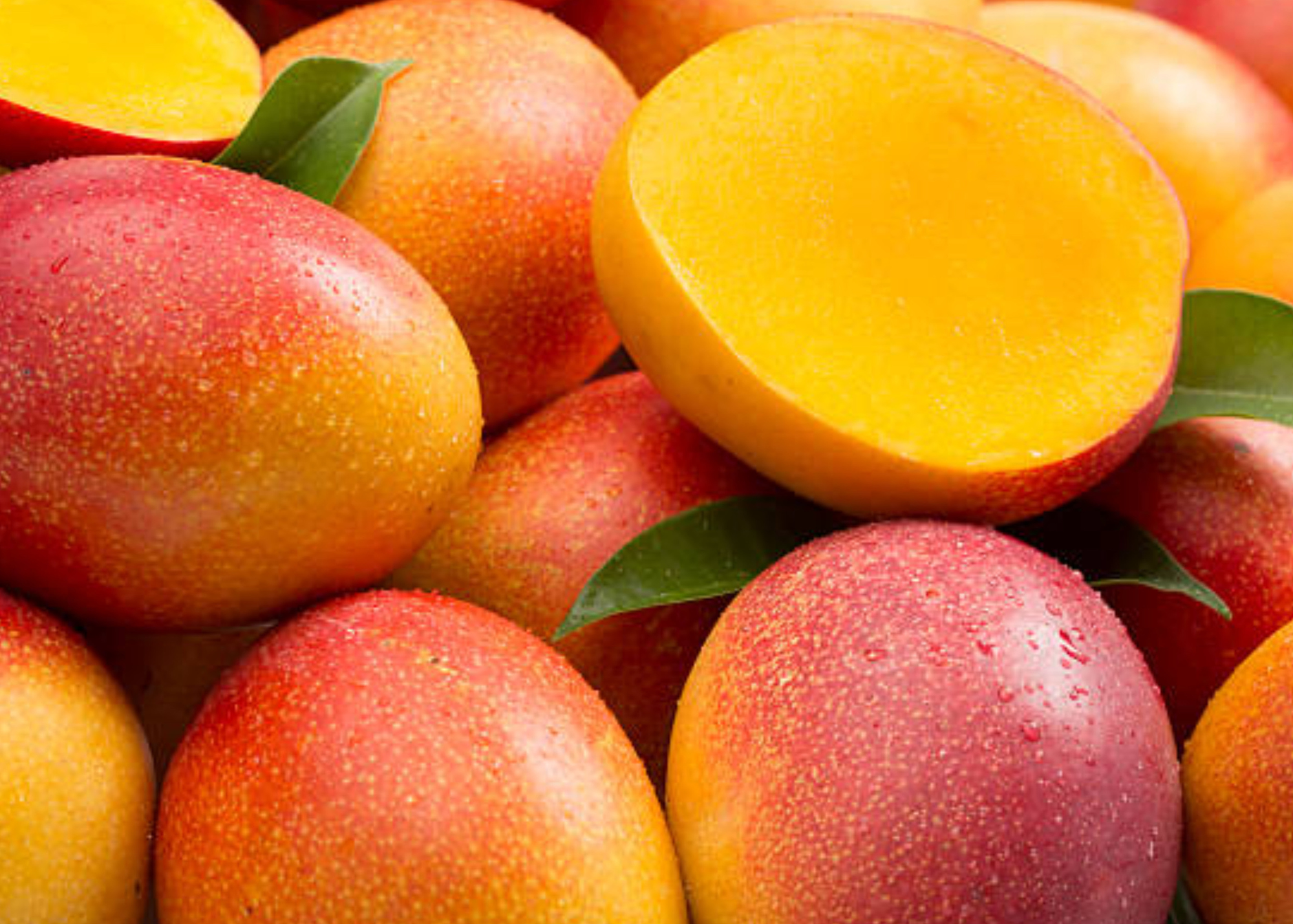 Mangos with one cut in half