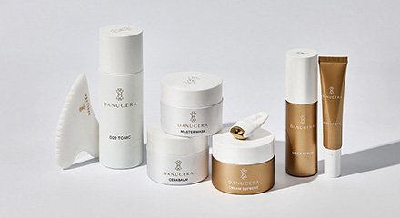 Danucera Collection of skincare products including Danucera D22 Tonic, The Sculpting Stone, Cream Supreme, Mega Serum, Iconic Eye, Cerabalm and Master Mask.