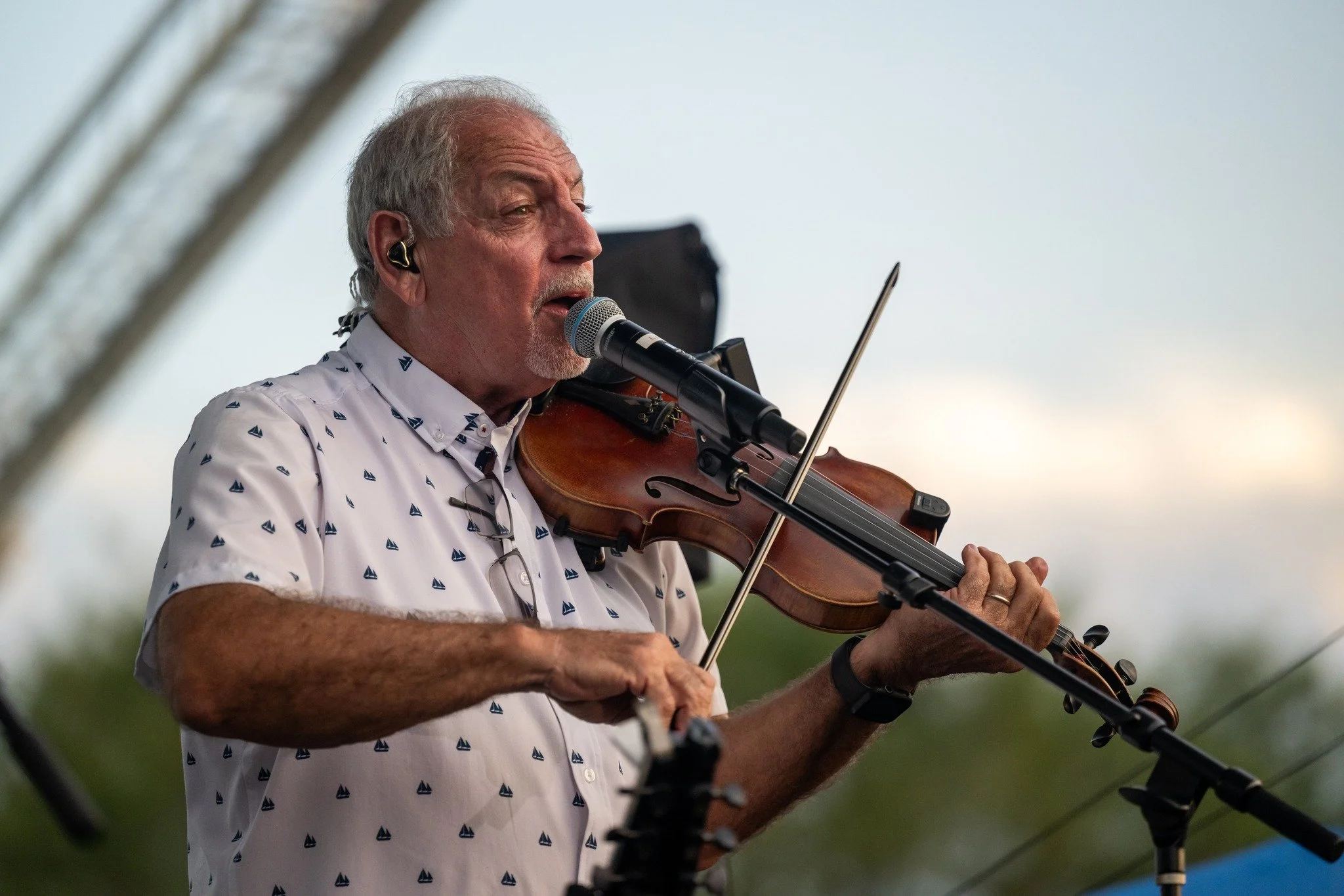 Larry Menard is the fiddle/guitar and vocalist for the Coteau Grove Band.