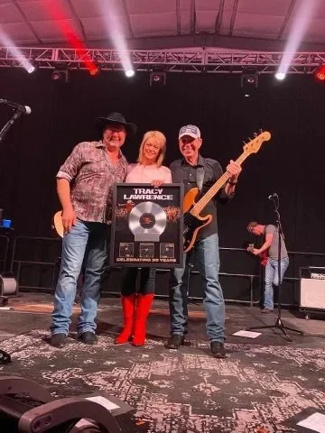 Keith and Ginger Myers with Tracy Lawrence.