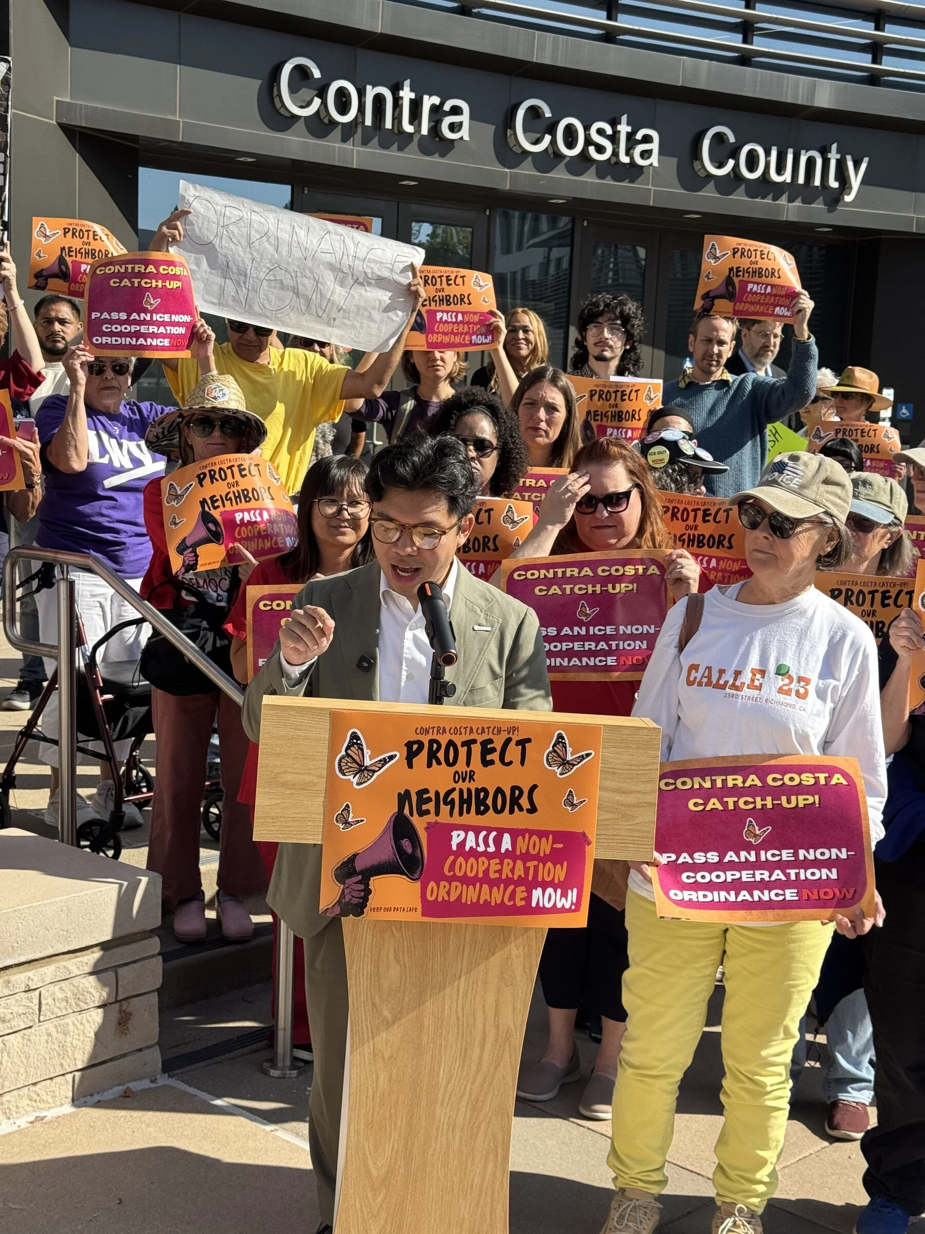 Community members and immigrant rights advocates speak at a Contra Costa press conference.