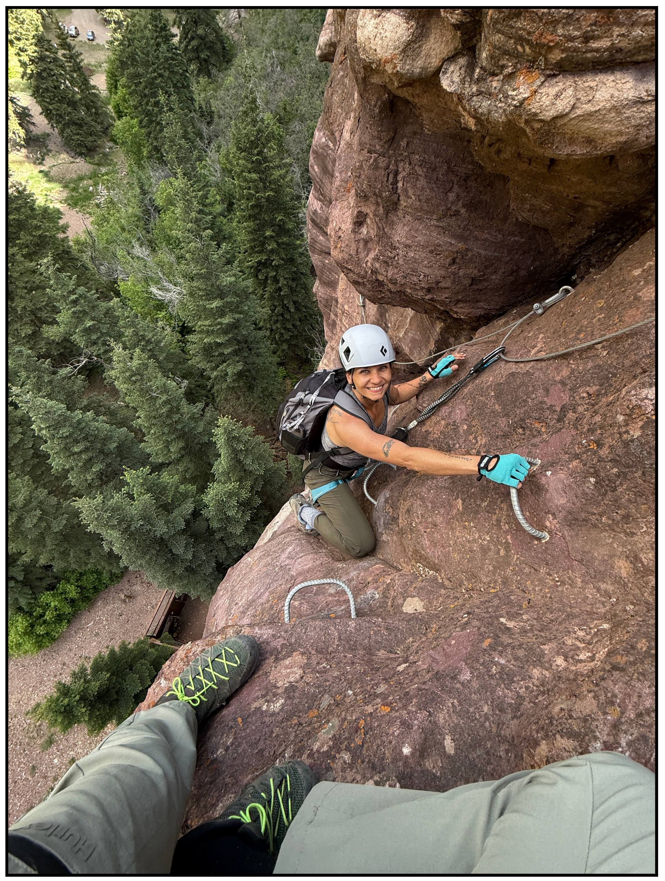 Coach Jenn rock climbing, building focus and resilience