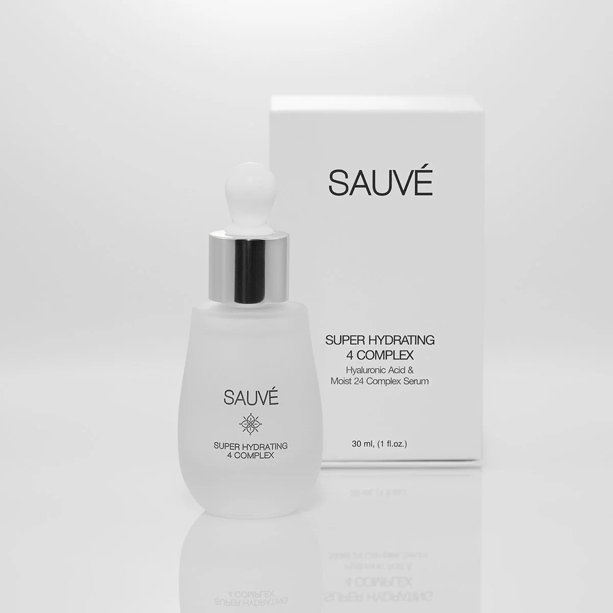 A white bottle with a dropper cap labeled 'SAUVÉ Super Hydrating 4 Complex' stands in front of a matching white box with similar text, containing a skincare serum.