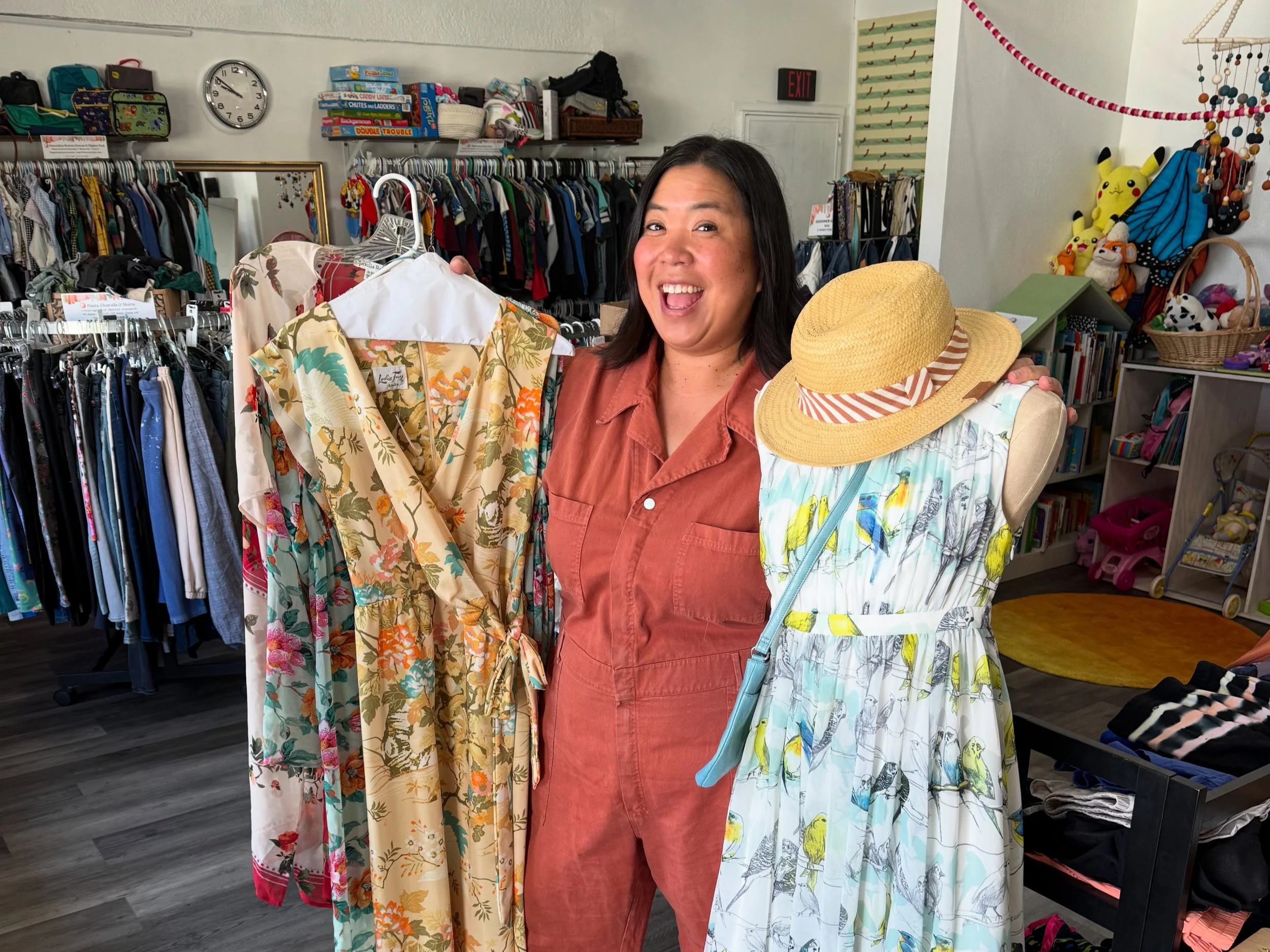 Sharon Chin - founder of Share Club, a thrift store and community space in West Adams / Jefferson Park - with vintage dresses