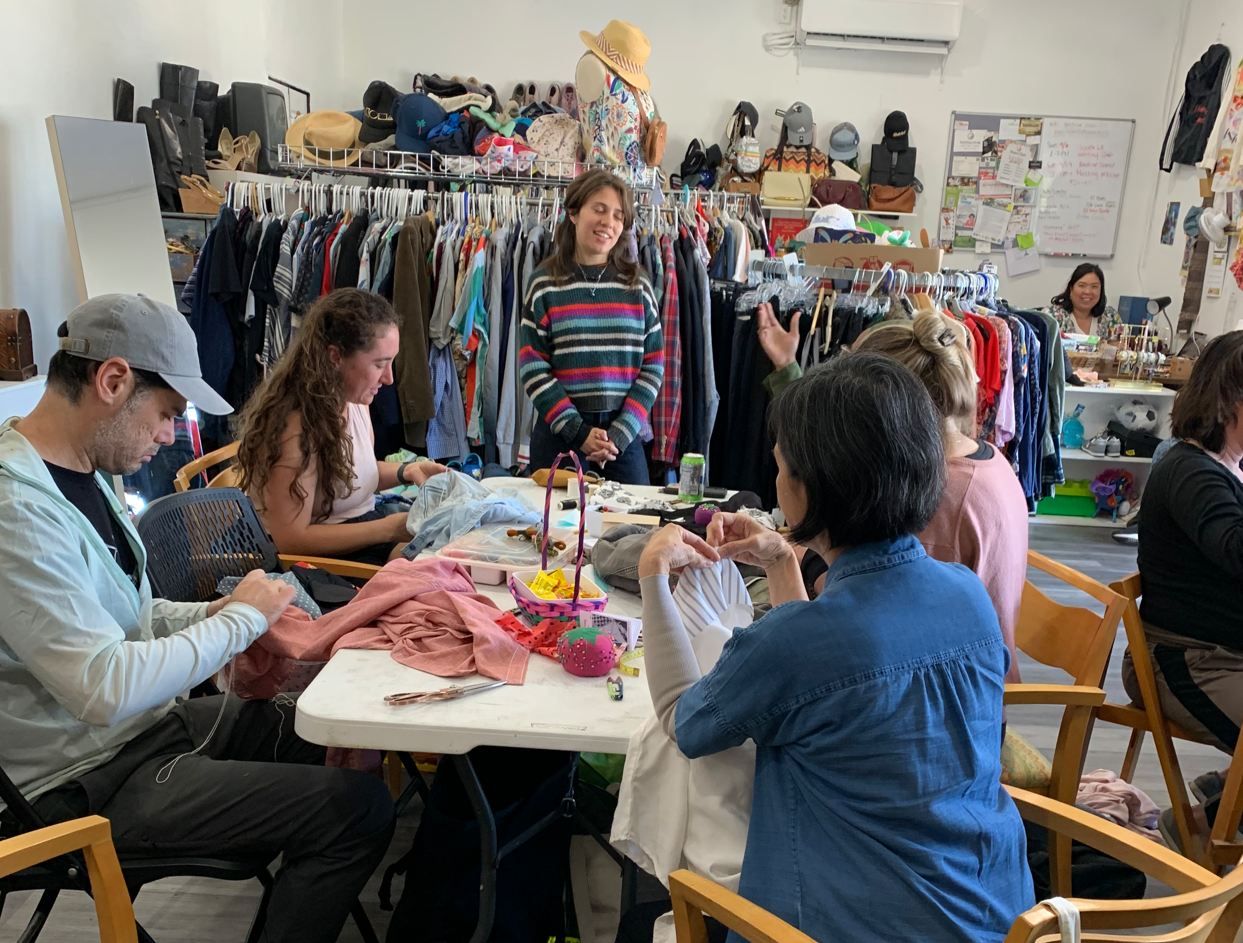 Community clothing repair event at Share Club, a thrift store and community space in West Adams / Jefferson Park