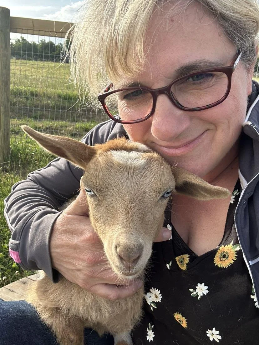 Crystal holding Olive (goat)