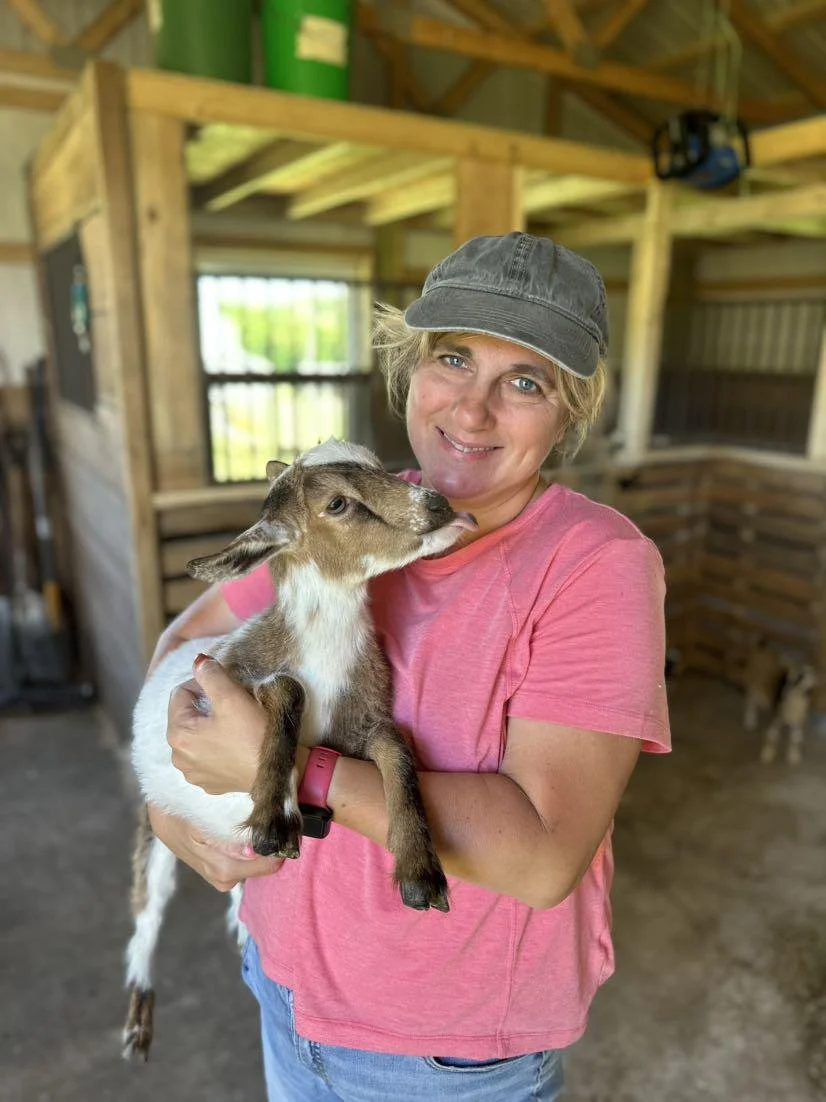 Crystal holding Dahlia (goat)