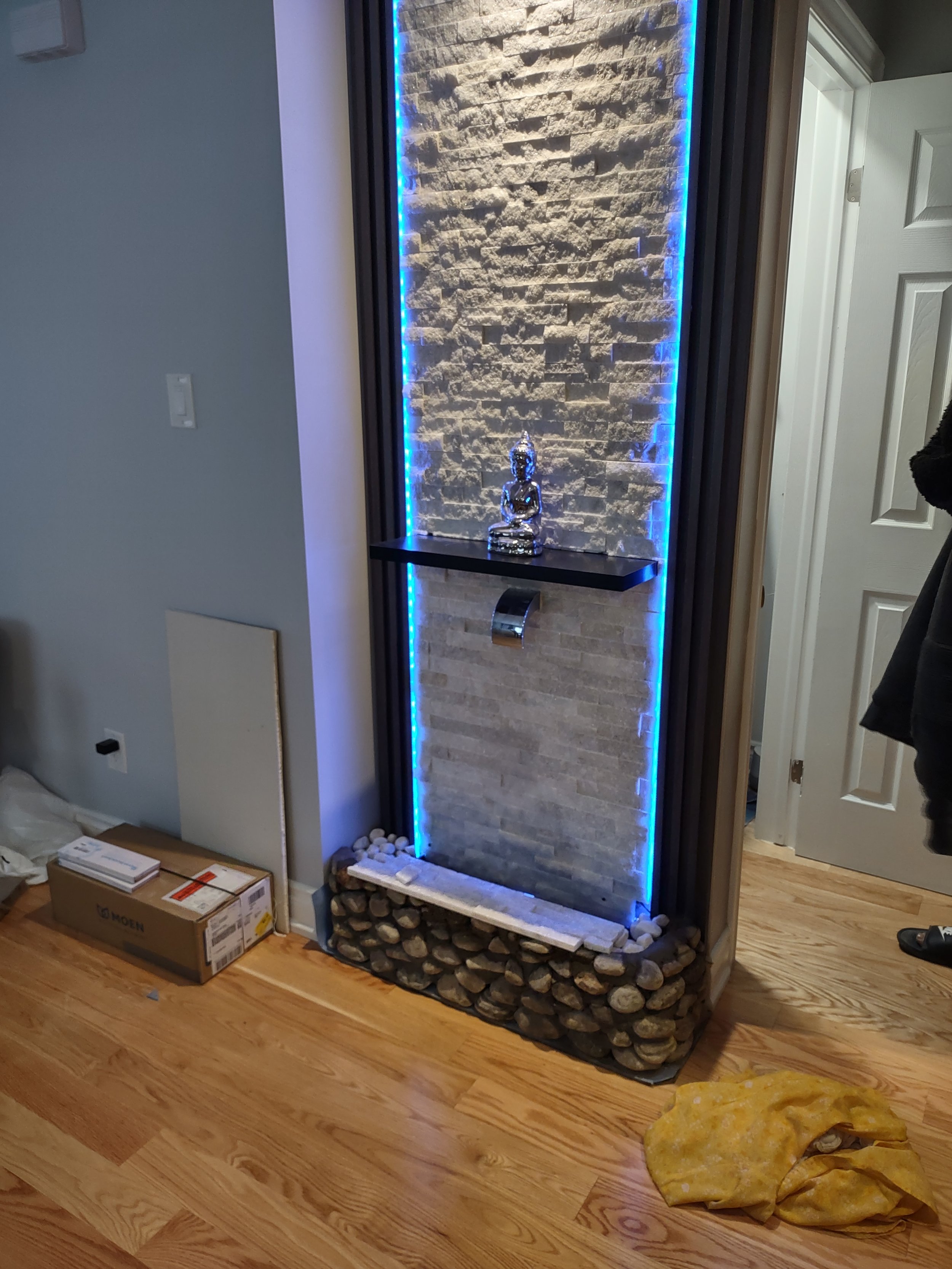 A small water fountain made by us in a living room!