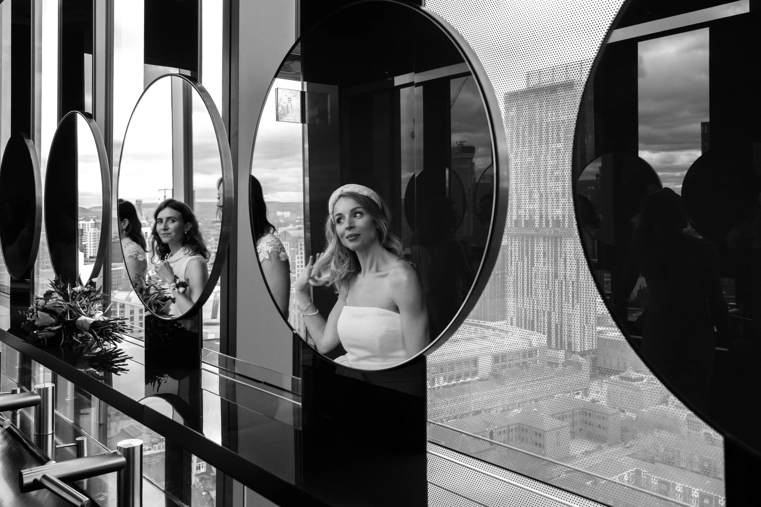 © 2026 LOWRI BURKINSHAW | Bride and Bridesmaids reflectons at a 20 Stories Manchester Wedding