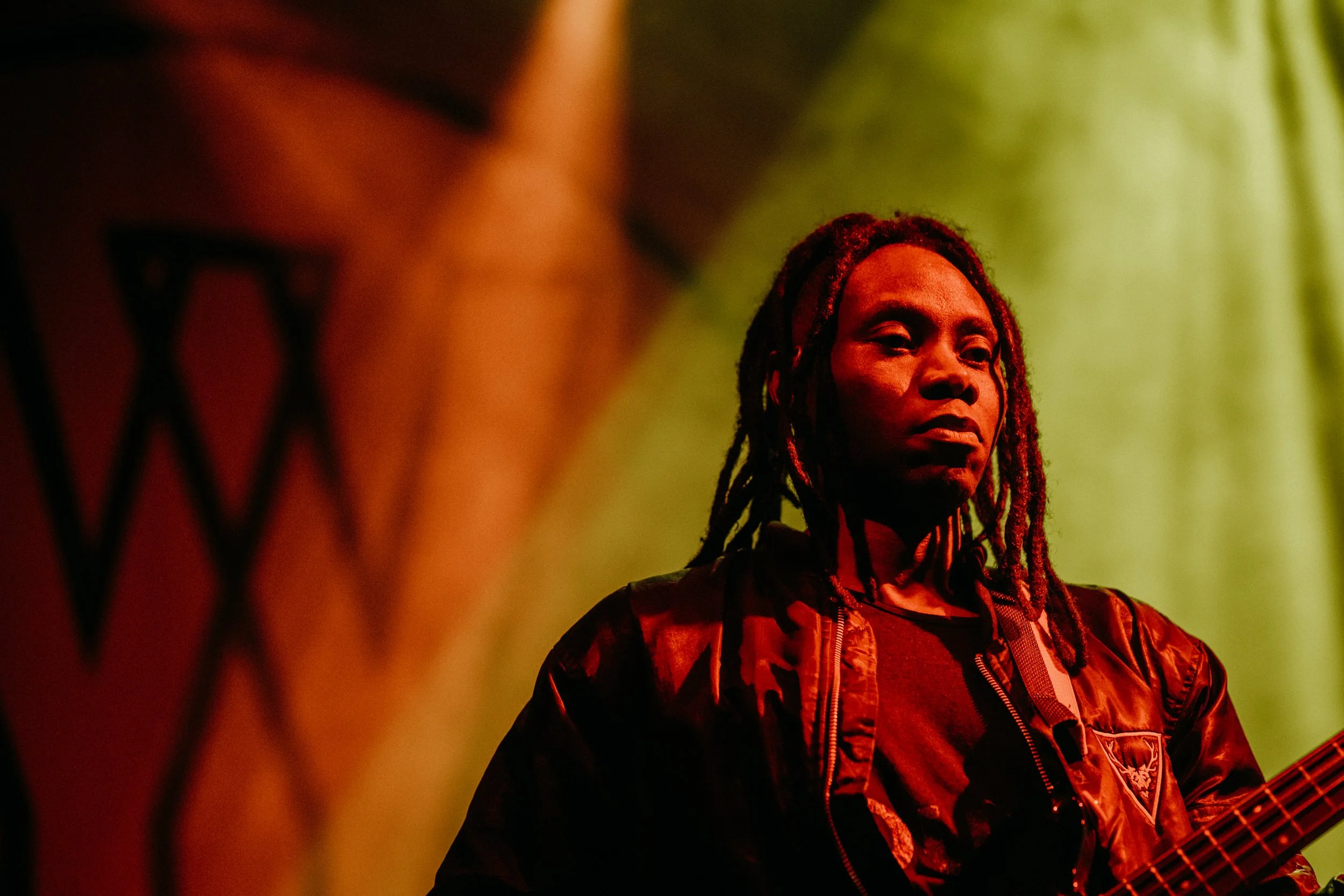 © 2026 LOWRI BURKINSHAW | Olugbenga Adelekan performing with Yannis & The Yaw at O2 Shepherd's Bush Empire 