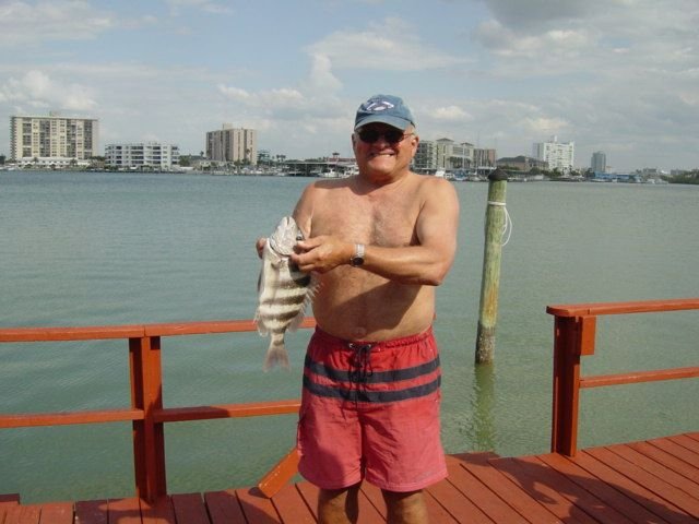 Guest Holding up Fish