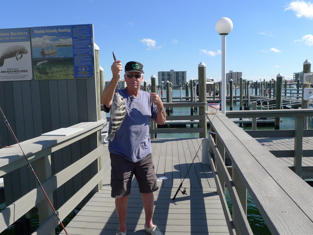 Guest Holding up Fish