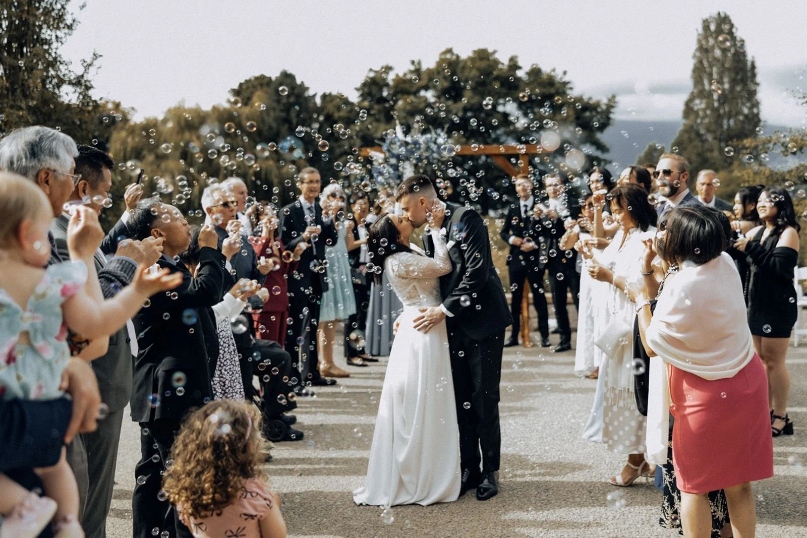  Newlyweds walking hand in hand after their ceremony at the Museum of Vancouver 