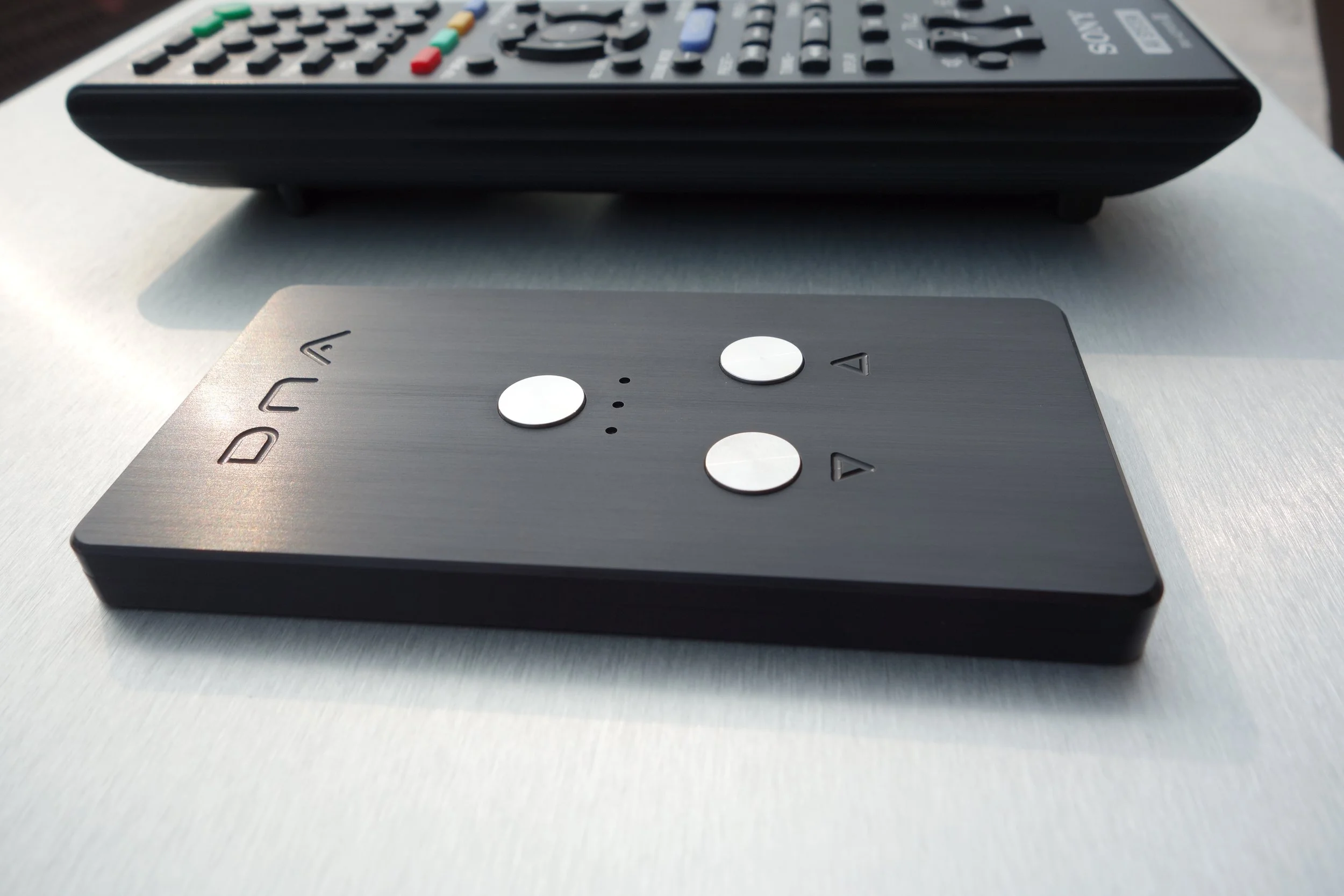 The ONIX AUDIO and OA21 DNA remote control - Three button & all functions .. We have 2 ears and one mouth .. Three is a magic number 