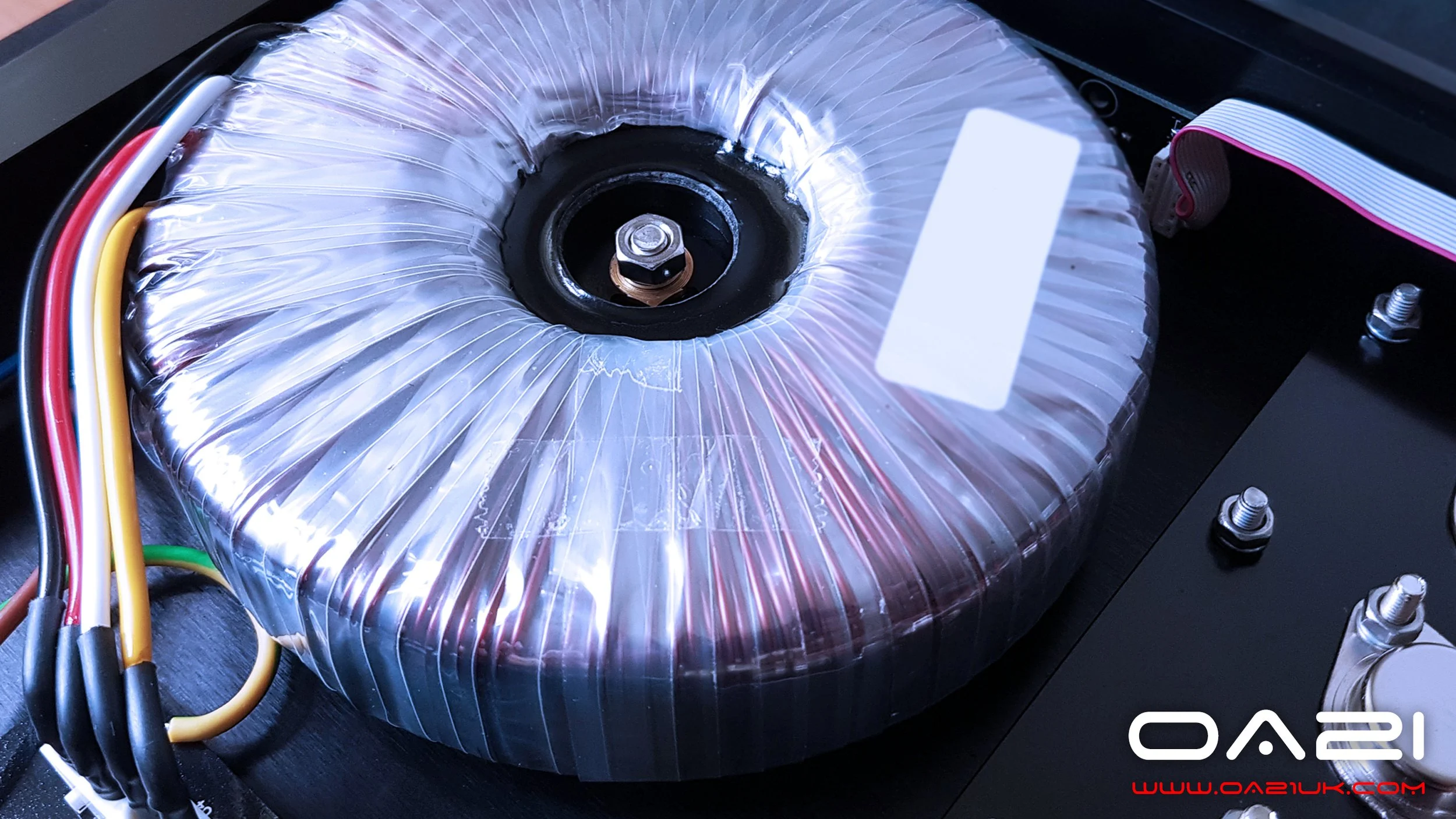 Close-up of a toroidal transformer, from the DNA Range of ONIX AUDIO Amplifiers   (C)  www.oa21.com