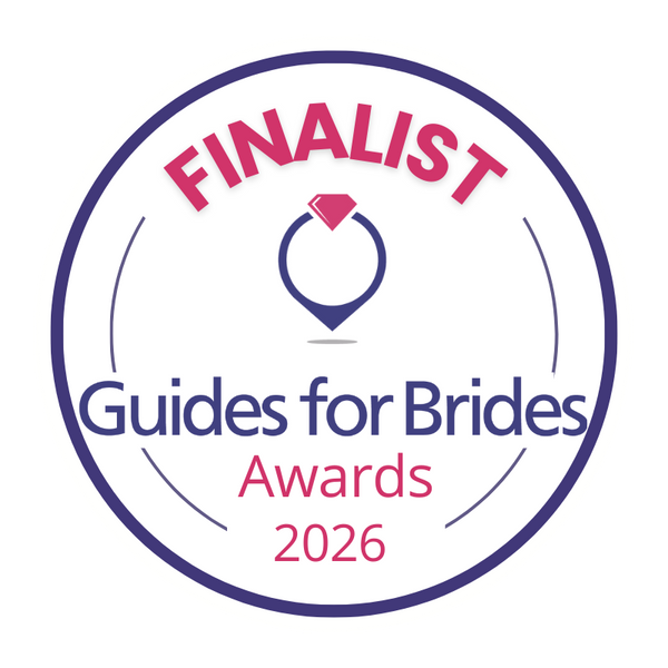 A circular badge with the words 'FINALIST' at the top, 'Guides for Brides Awards 2026' in the center, and a ring icon with a diamond at the top.