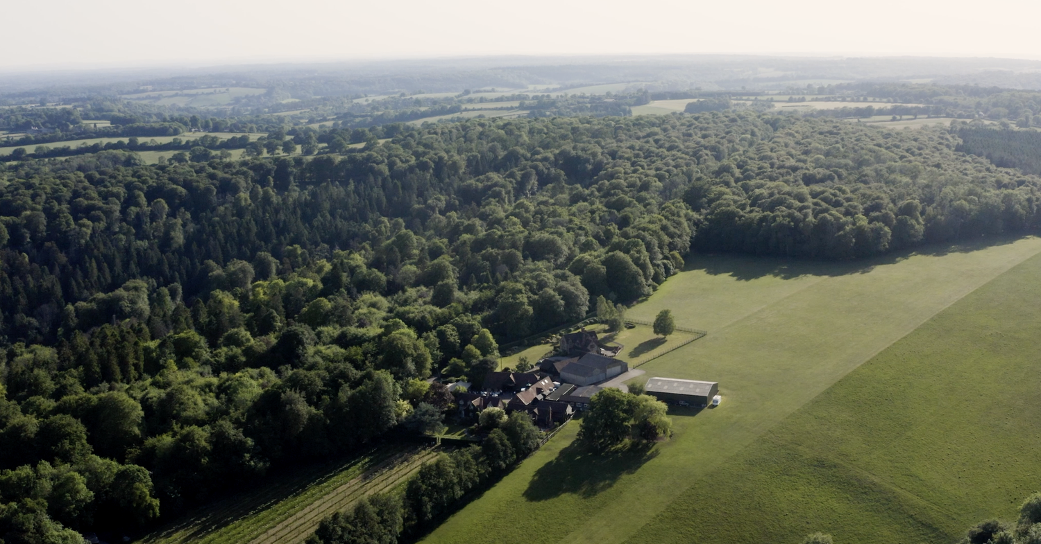 Aerial view of Old Luxters Barn in the Hambleden Valley near Henley-on-Thames