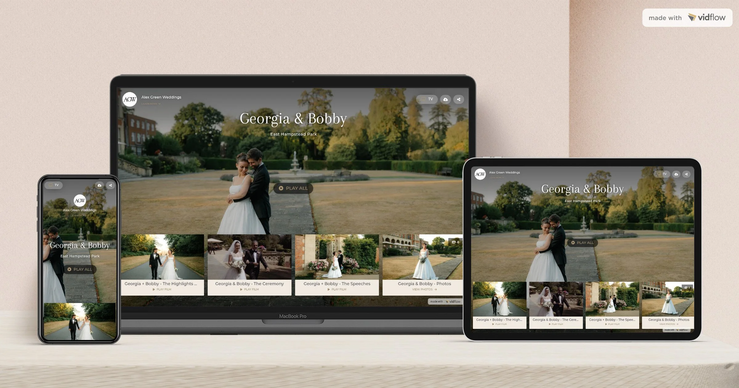 The image shows three electronic devices—a smartphone, a laptop, and a tablet—displaying a wedding video website titled "Georgia & Bobby" at East Hampstead Park, with a picture of a bride and groom in a park setting. The website offers options to play films and view photographs, presented on a neutral background surface.