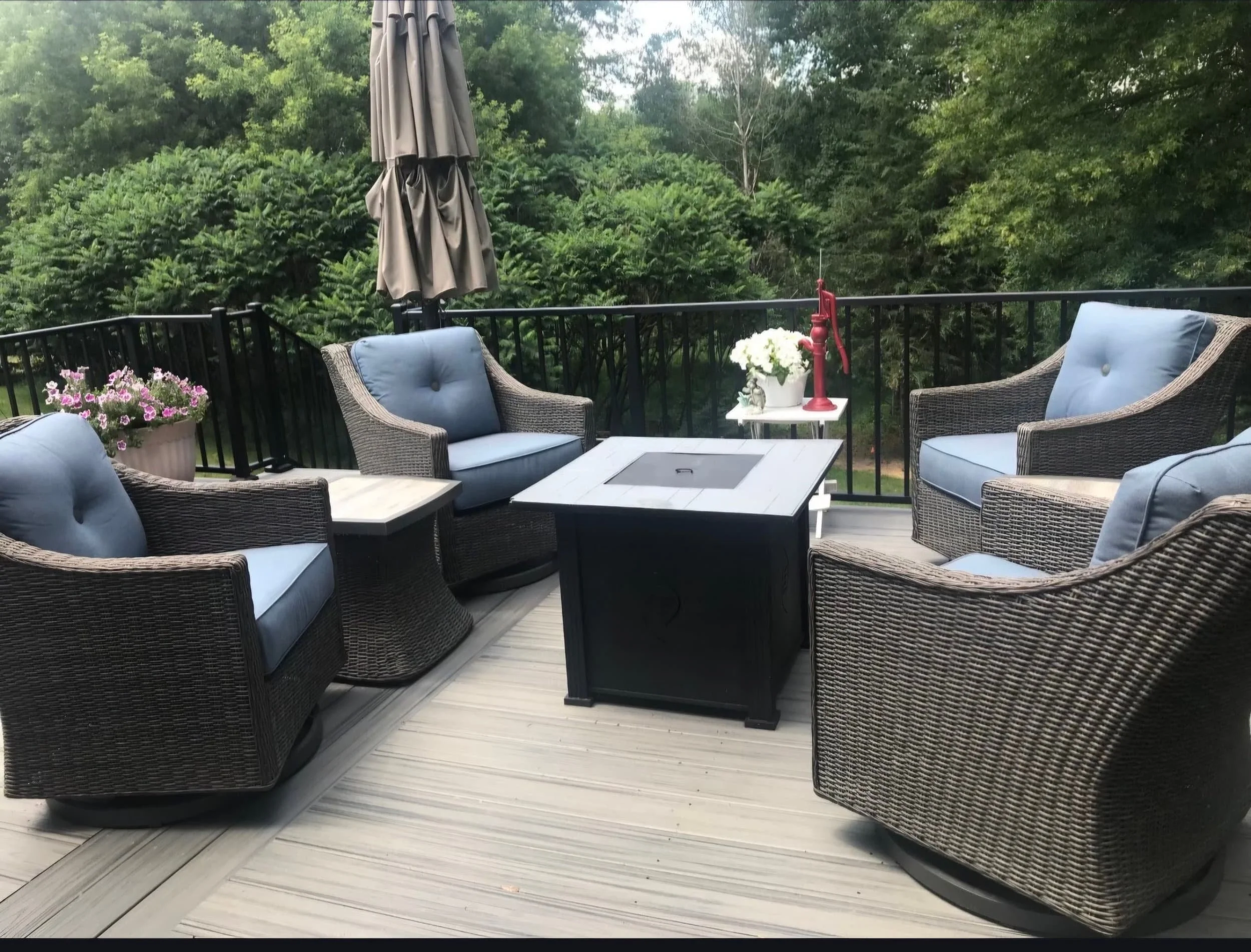 Composite deck installation with black railings Hudson WI backyard