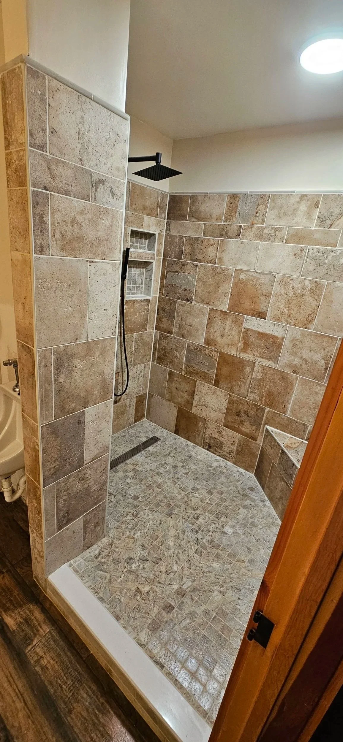 Tile walk in shower with bench