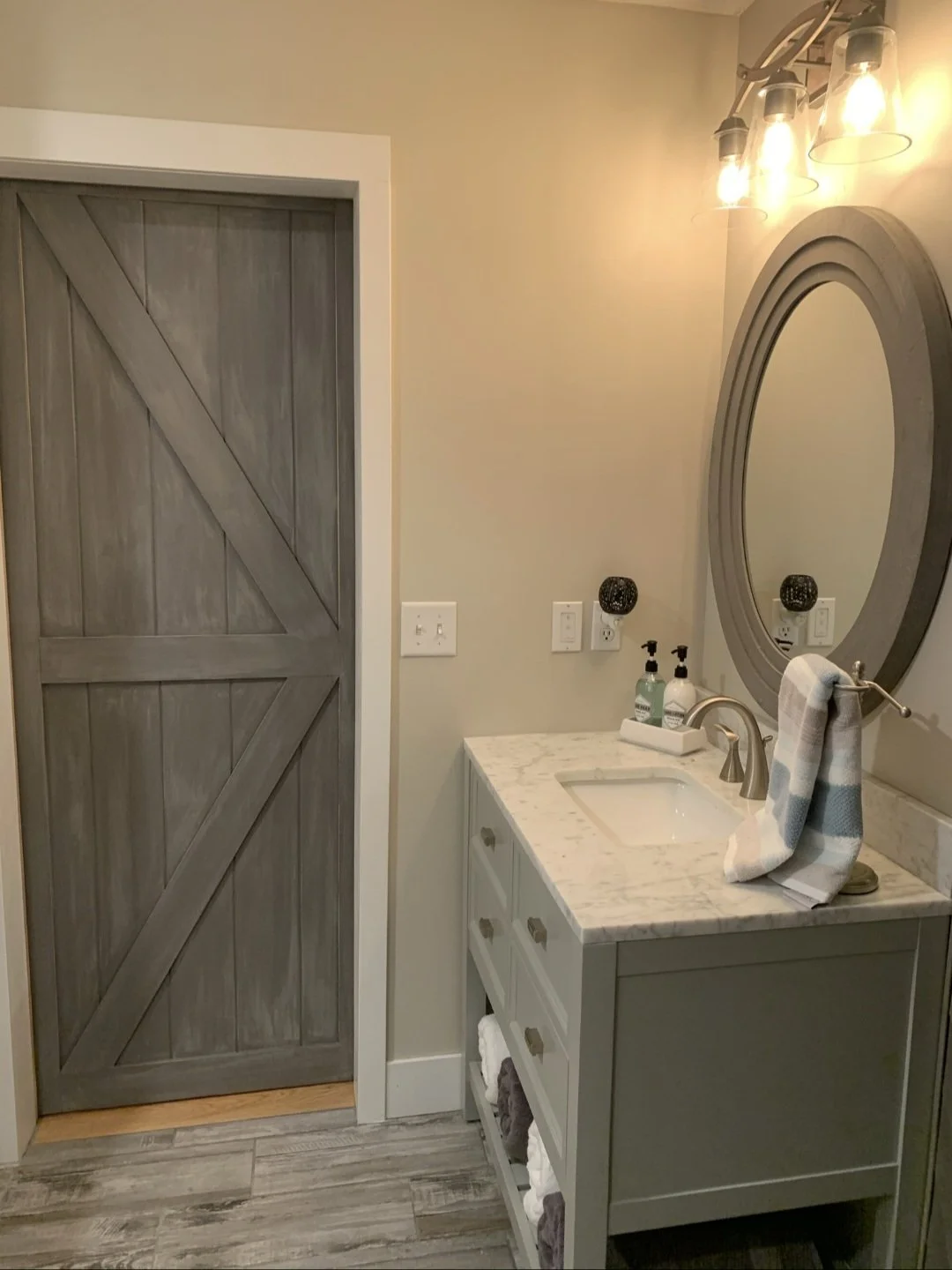 Guest bath remodel with pocket door Wyoming MN efficient