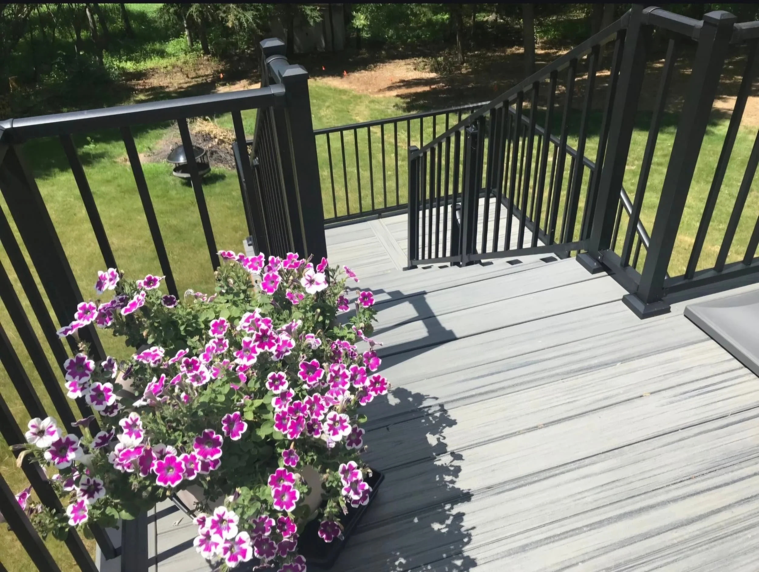 Multi-level deck featuring pergola Stillwater MN lakeside home