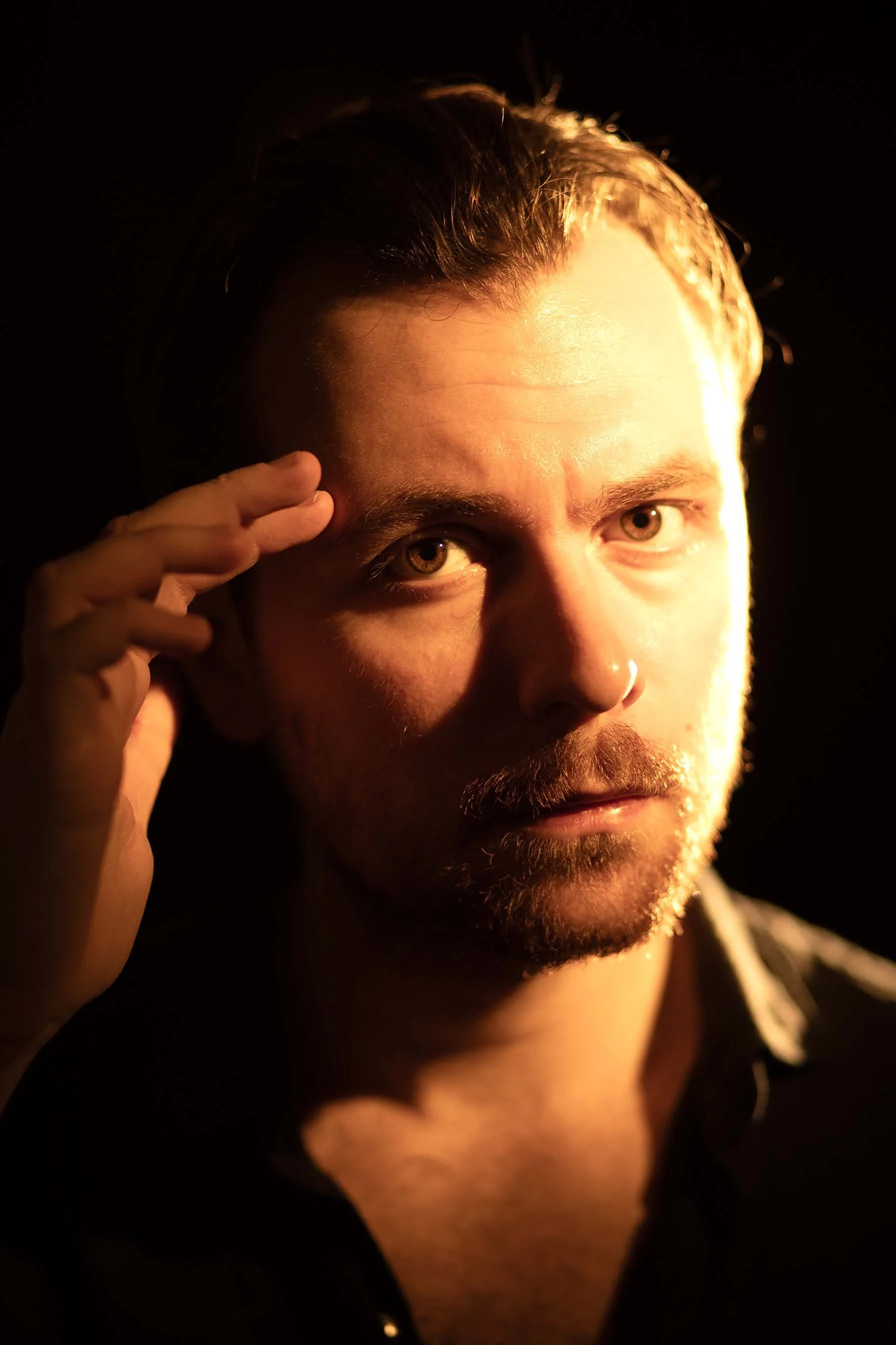 Headshot of Nathan Tosoni, film director and screenwriter