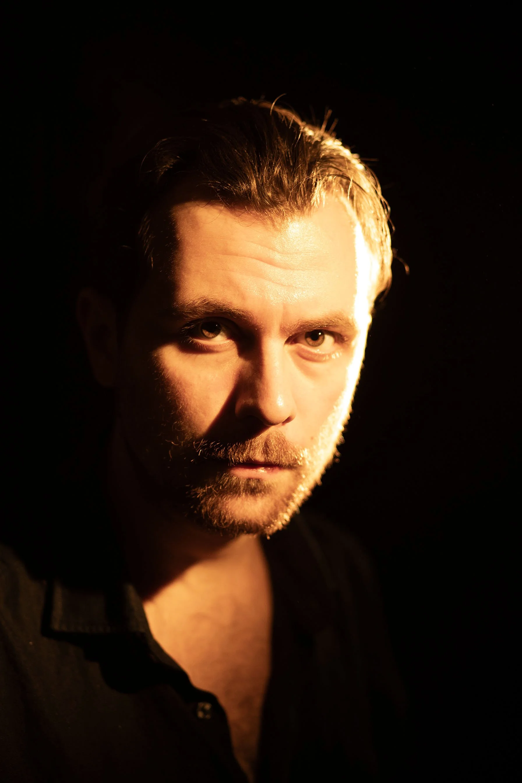 Headshot of Nathan Tosoni, film director and screenwriter