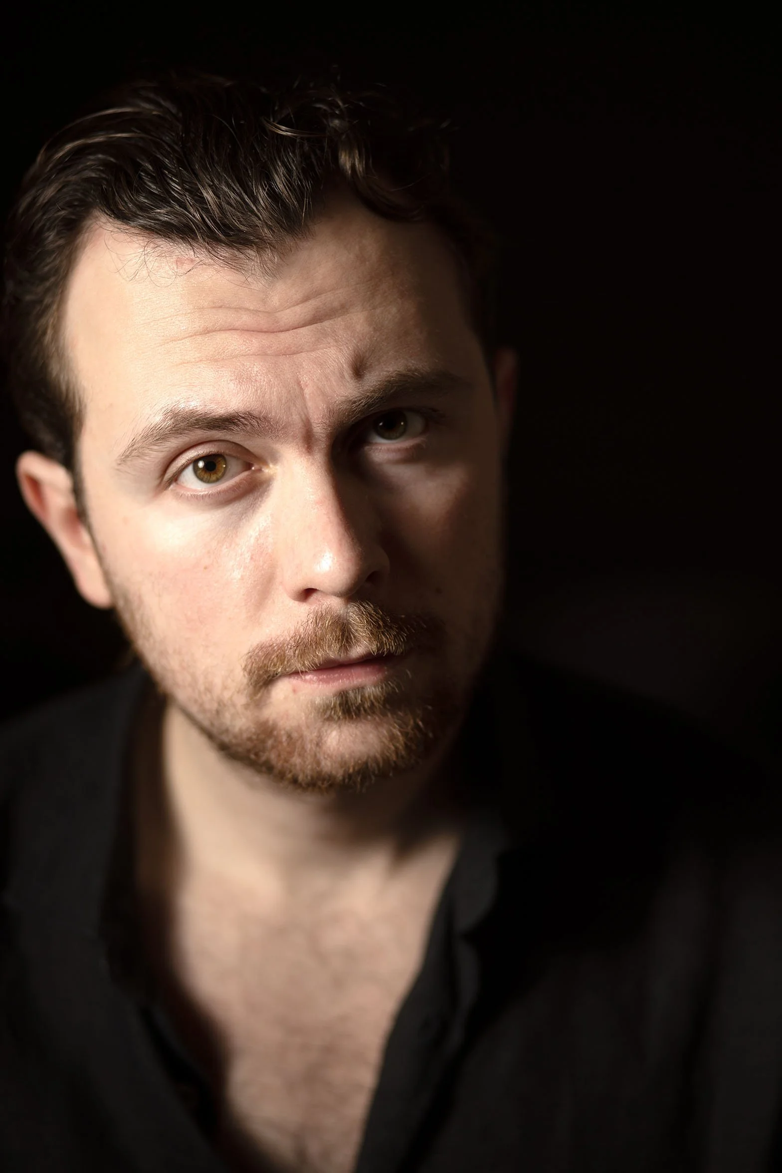 Headshot of Nathan Tosoni, film director and screenwriter