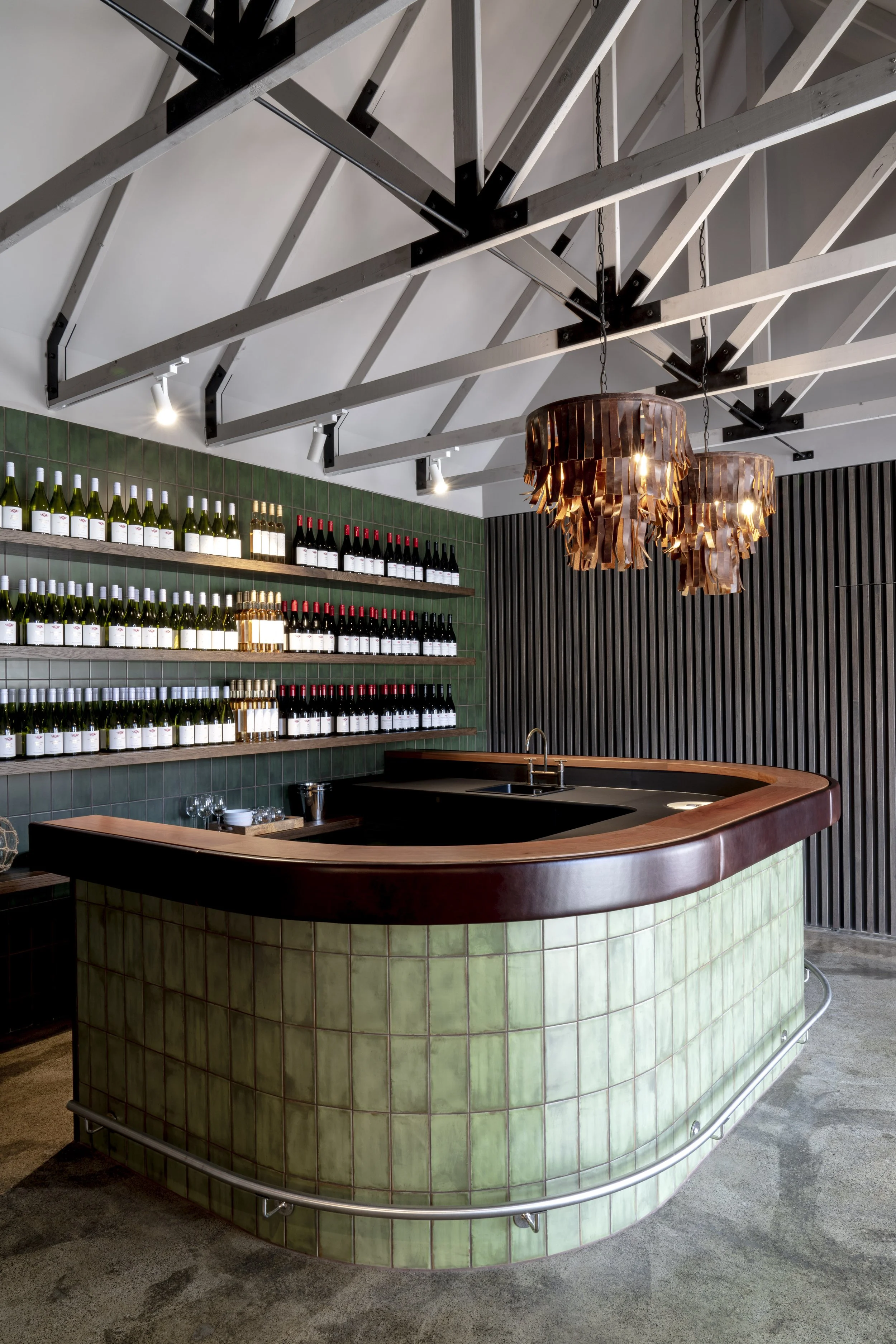 Mantons Creek Estate Cellar Door Shoreham wine cellar door featuring tasting bar, natural materials and vineyard outlook