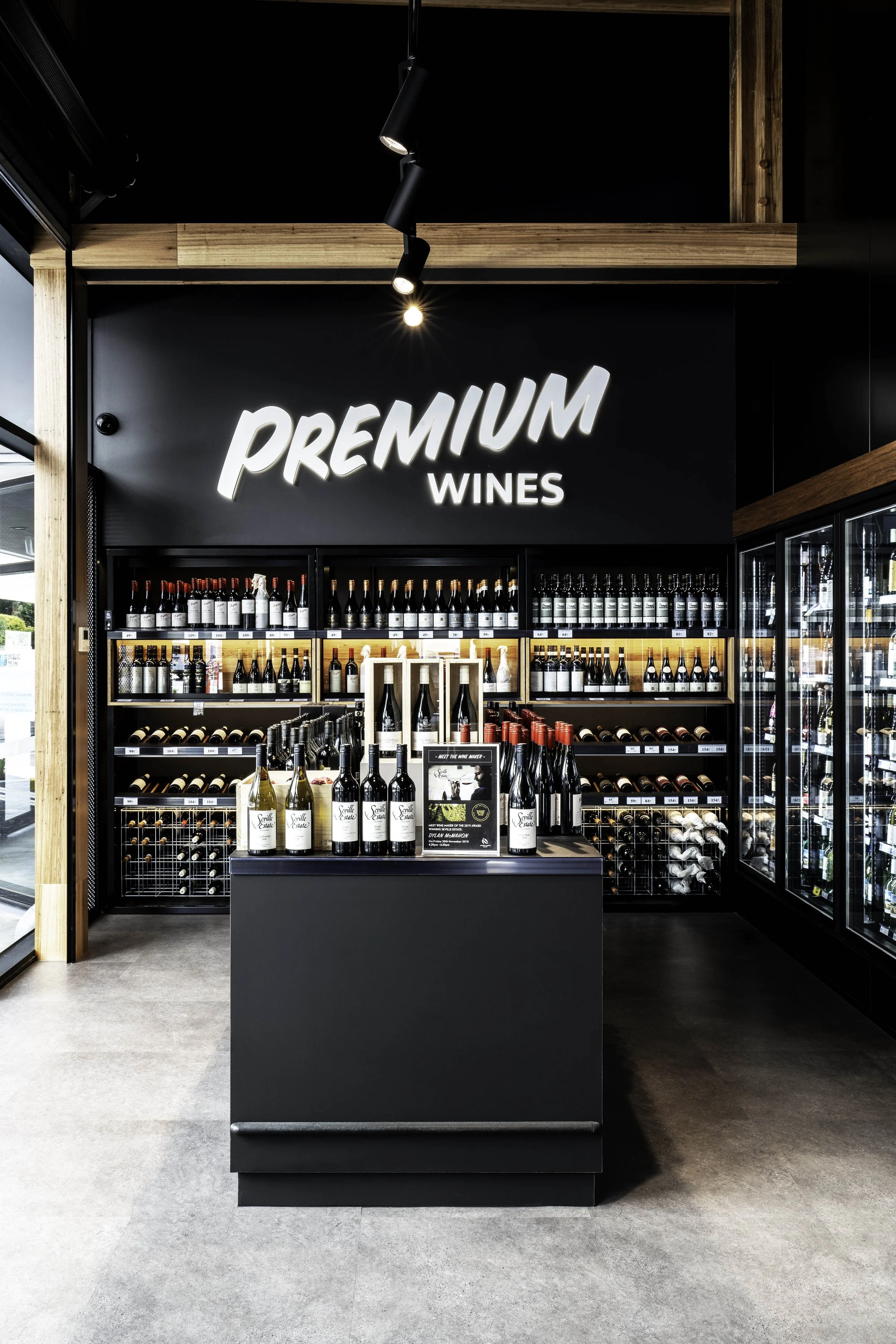 Bottle shop in Lower Plenty at Lower Plenty Bottlemart featuring timber shelving, curated displays and warm retail lighting